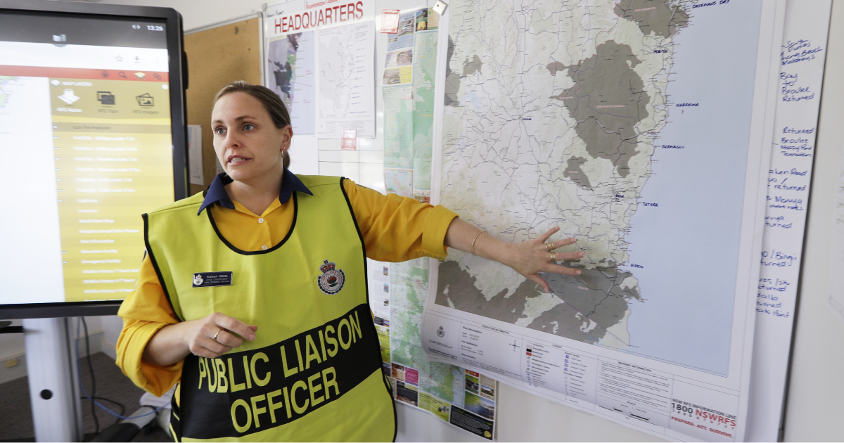 Public Liaison Officer Kelwyn White outlines conditions on the several fires burning near Moruya, Australia on Jan. 9, 2020. (Rick Rycroft/AP)