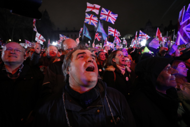 Brexit supporters gather during a rally in London on Friday, Jan. 31, 2020. (Frank Augstein/AP Photo)