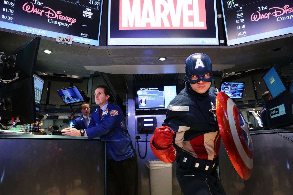 Captain America poses for photographers on the floor of the New York Stock Exchange in New York City on April 1, 2014. (Spencer Platt/Getty Images)