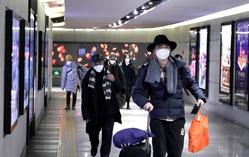 China Coronavirus Claims Sixth Victim as Holiday Travel Heightens Infection Risks