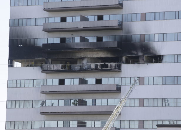 Fire and smoke damage is seen on the exterior of a residential building in Los Angeles, on Jan. 29, 2020. (Damian Dovarganes/AP Photo)