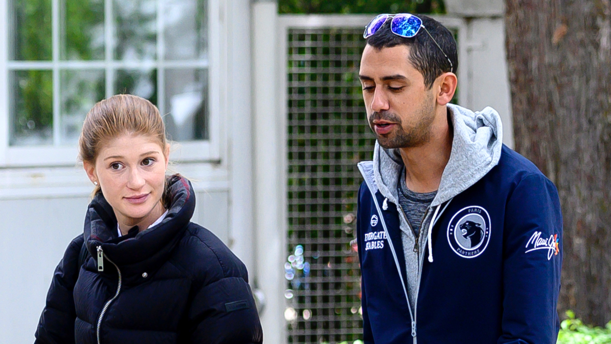 Jennifer Gates and Nayel Nassar walking