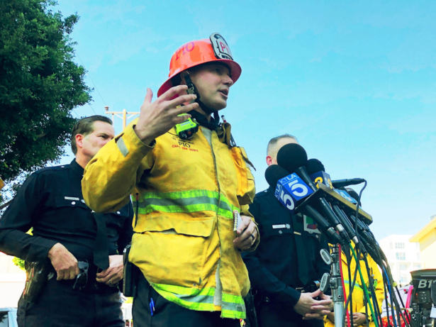 Los Angele Fire Department Capt. Erik Scott talks about a fire that broke out at a 25-story high-rise apartment building, in West Los Angeles, Calif., on Jan. 29, 2020. (Stafanie Dazio/AP Photo)