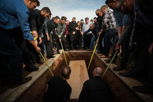 Members of local Mormon communities and relatives of the extended LeBaron family attend the funeral held for Christina Marie Langford in Le Barón, Mexico, on Nov. 9, 2019.