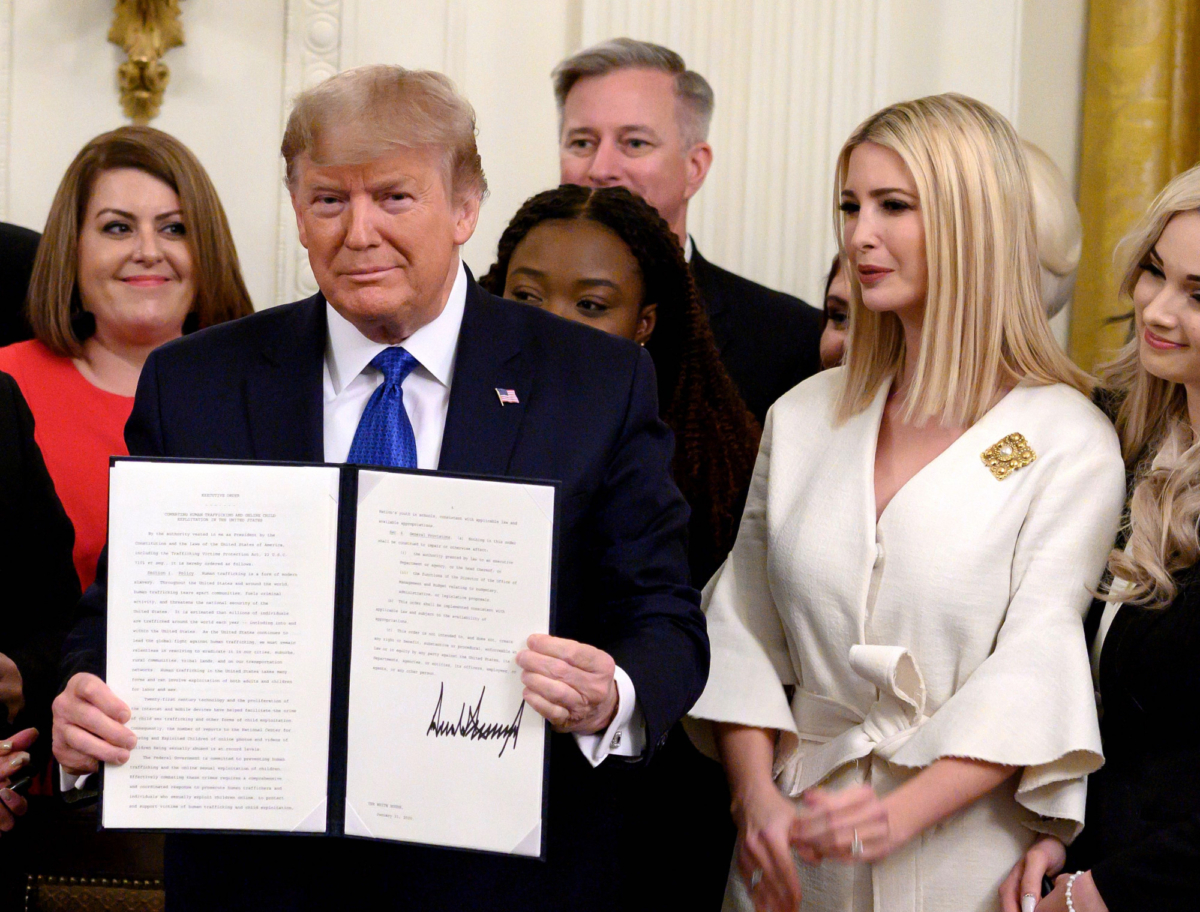 Trump holds up an executive order