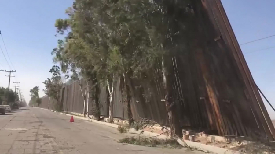 Portion of US Border Wall in California Falls Due to High Winds and Lands on Mexican Side