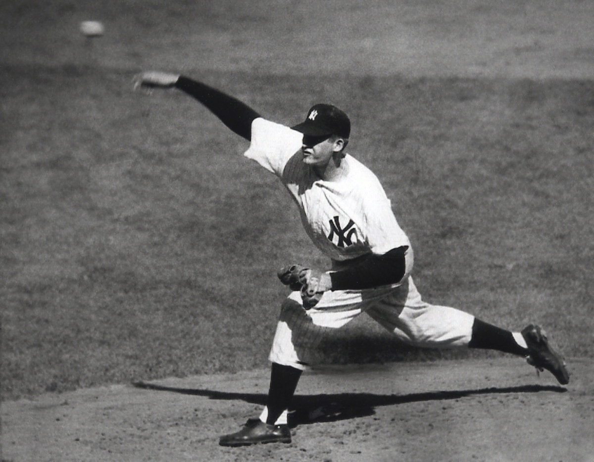 New York Yankees right-hander Don Larsen delivers a pitch in the fourth inning of Game 5 of the World Series Oct. 8, 1956 en route to the first World Series perfect game. The Yankees won 2-0 and went on to win the series. (AP Photo)