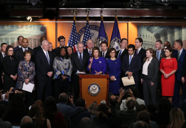 US House Speaker Nancy Pelosi (D-CA) speaks while flanked by fellow members during a news conference on the USMCA trade agreement, on Capitol Hill in Washington, on Dec. 10, 2019.(Mark Wilson/Getty Images)