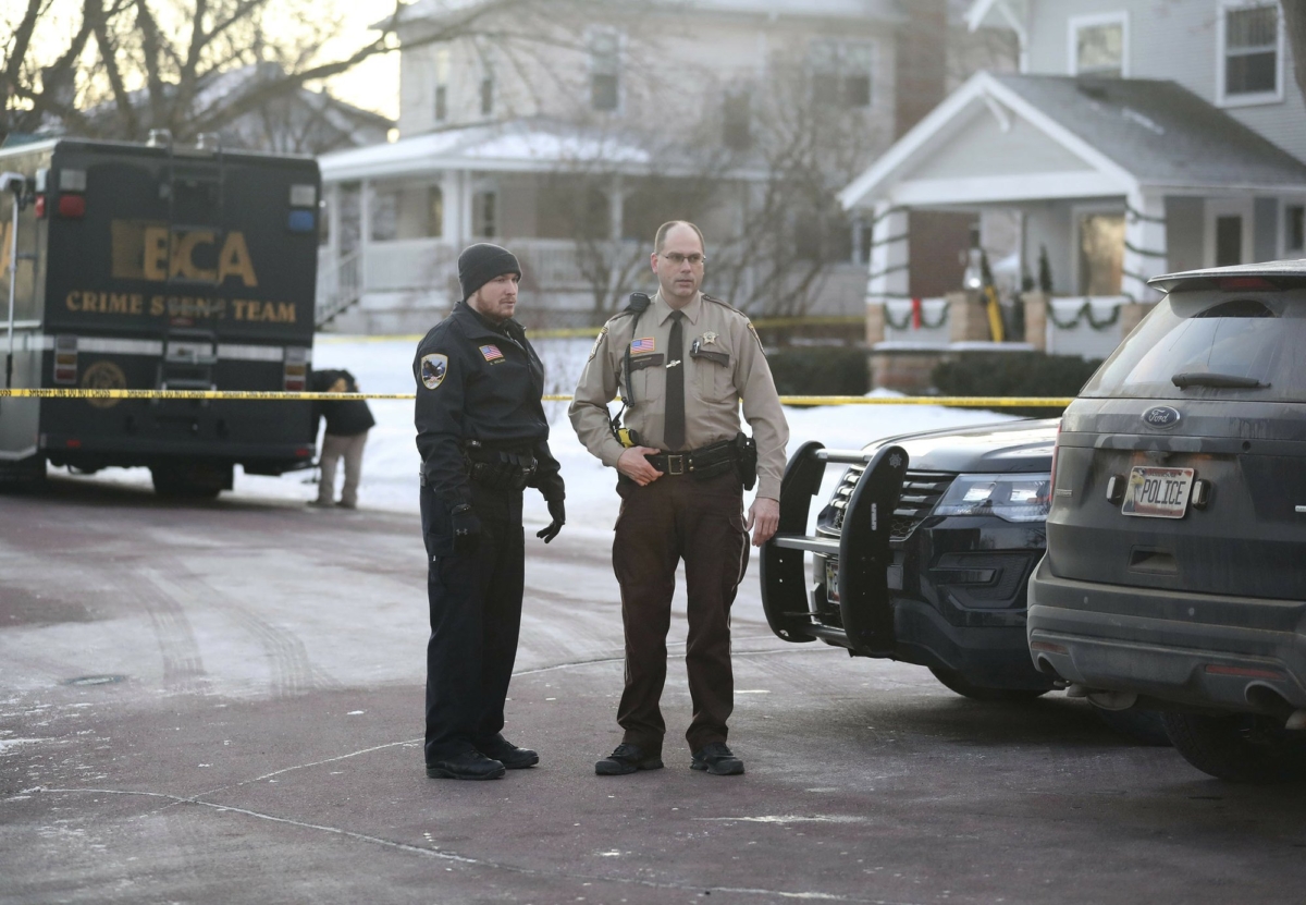 Law enforcement officers work at the scene of a shooting in Waseca, Minn., on Jan. 7, 2019. (David Joles/Star Tribune via AP)