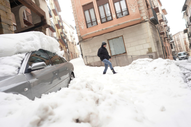 A man walks during the storm "Gloria" in Morella, Spain, on Jan. 22, 2020. (Juan Medina/Reuters)