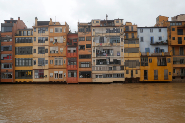 Houses are seen on the Onyar river during the storm "Gloria" in Girona, Spain, on Jan.22, 2020. (Nacho Doce/Reuters)