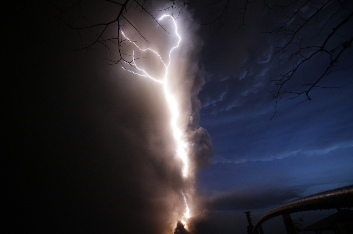 Lightning flashes as Taal Volcano erupts, in Tagaytay, Philippines, on Jan. 12, 2020. (Aaron Favila/AP photo)