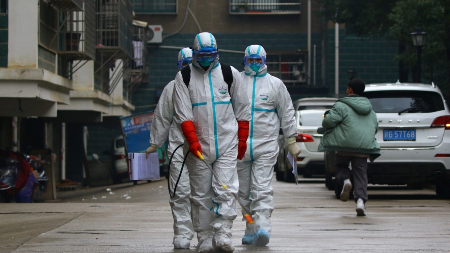 Death Toll in China from Viral Outbreak Rises to 56 As Confirmed Cases Top 2,000
