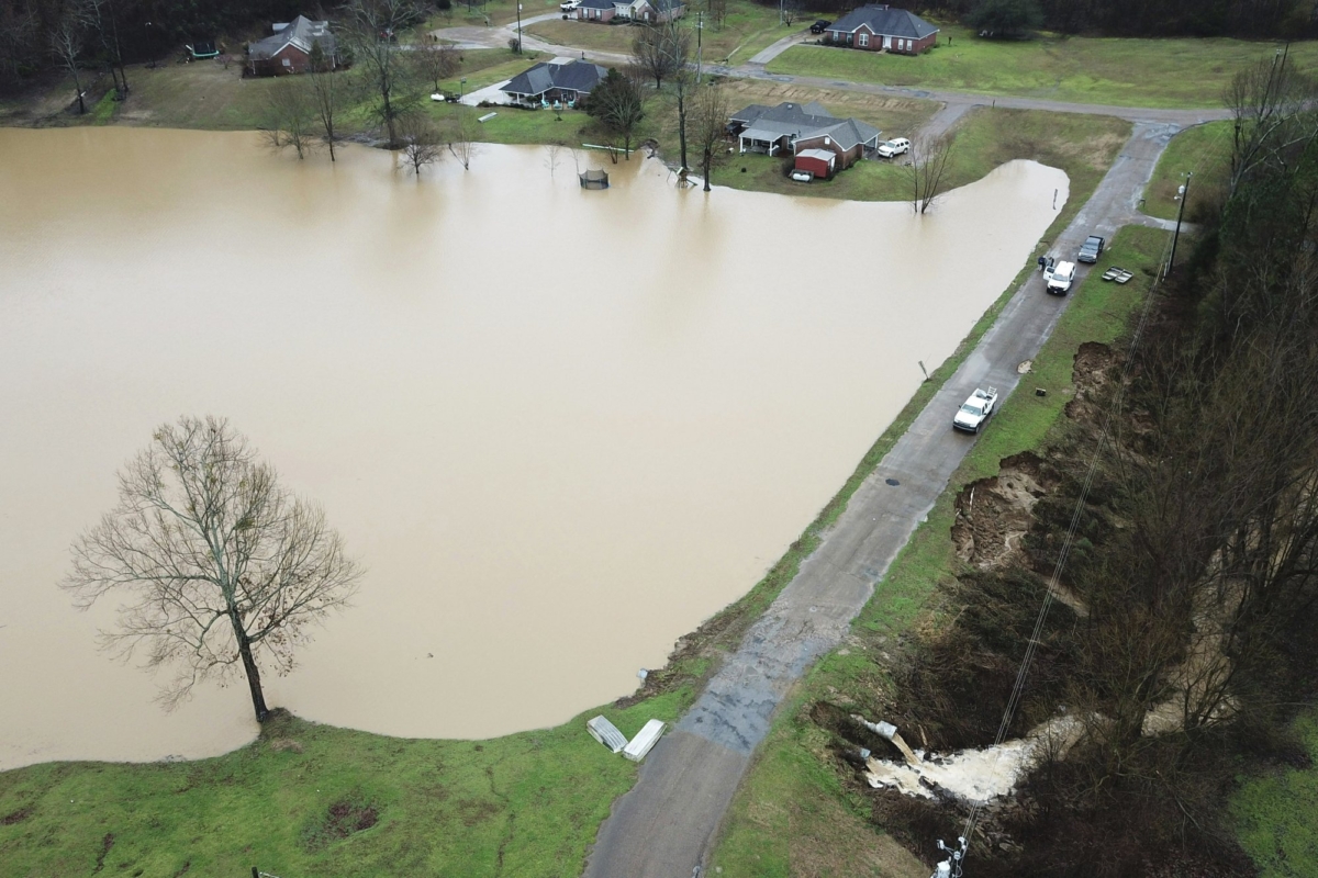 This aerial drone photo provided by the Mississippi Emergency Management Agency shows a potential dam/levee failure in the Springridge Place subdivision in Yazoo County, Miss., on Feb. 11, 2020. (David Battaly/Mississippi Emergency Management Agency via AP)