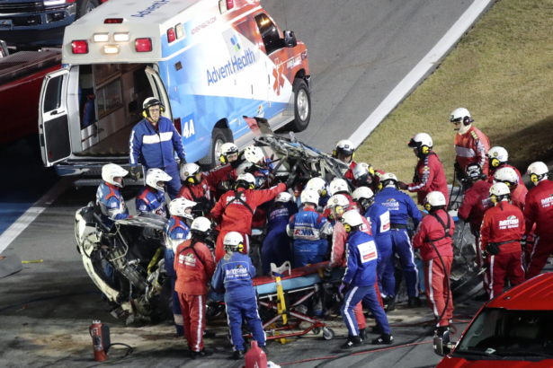 Rescue workers remove Ryan Newman from his car after he was involved in a wreck on the last lap of the NASCAR Daytona 500 auto race at Daytona International Speedway, in Daytona Beach, Fla., on Feb. 17, 2020. (David Graham/AP Photo)