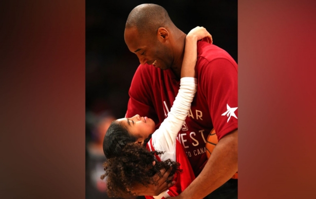 Kobe Bryant #24 of the Los Angeles Lakers and the Western Conference warms up with daughter Gianna Bryant during the NBA All-Star Game 2016 at the Air Canada Center in Toronto, Canada, on Feb. 14, 2016. (Elsa/Getty Images)