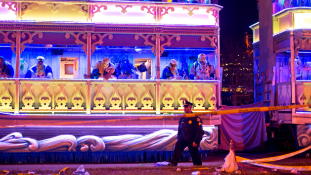 A police officer works the scene where a man was reportedly hit and killed by a float of the Krewe of Endymion parade in the runup to Mardi Gras in New Orleans, on Feb. 22, 2020. (Max Becherer/The Advocate via AP)