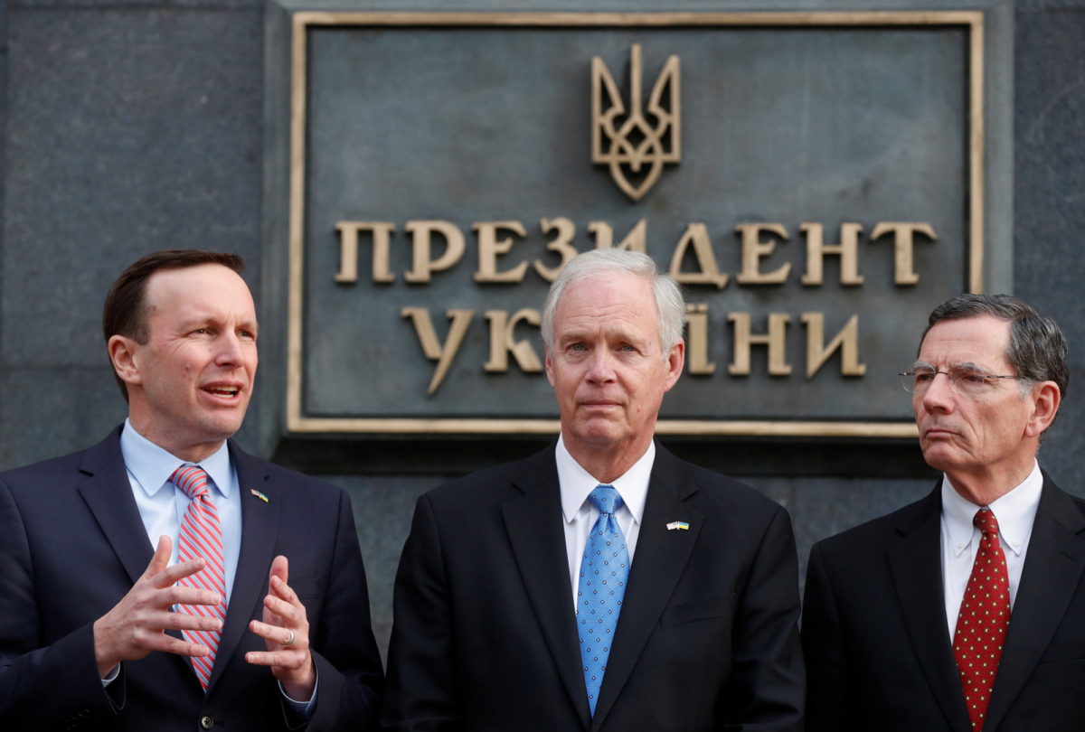 U.S. Senators Ron Johnson, John Barrasso, and Chris Murphy attend a news briefing following their meeting with Ukrainian President Volodymyr Zelenskiy in Kiev on Feb. 14, 2020. (Valentyn Ogirenko/Reuters)