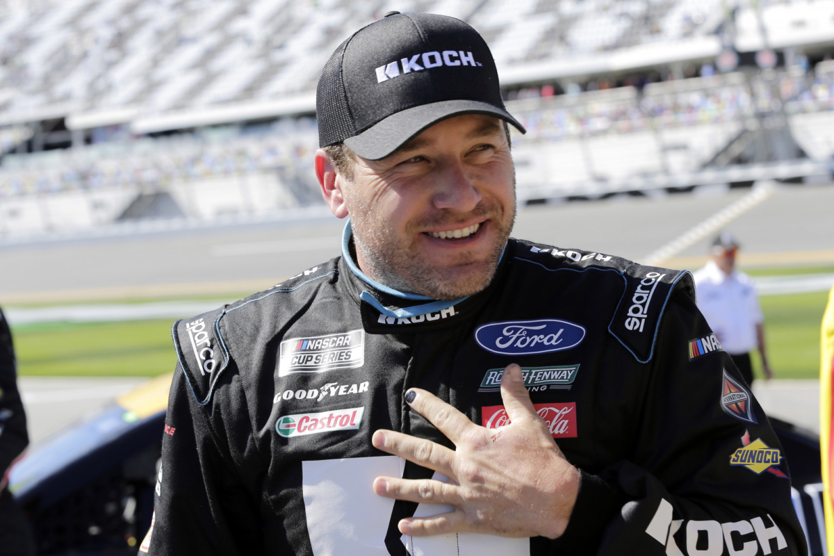 Ryan Newman stands on pit road after his run during NASCAR auto race qualifying at Daytona International Speedway, in Daytona Beach, Fla., on Feb. 9, 2020. (Terry Renna/AP Photo)