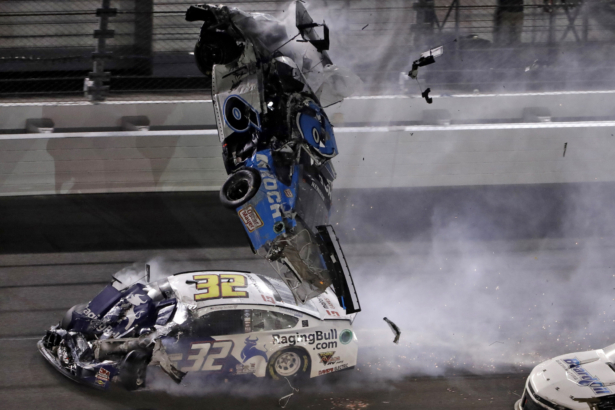 Ryan Newman (6) goes airborne after crashing into Corey LaJoie (32) during the NASCAR Daytona 500 auto race at Daytona International Speedway in Daytona Beach, Fla., on Feb. 17, 2020. (Chris O'Meara/AP Photo)