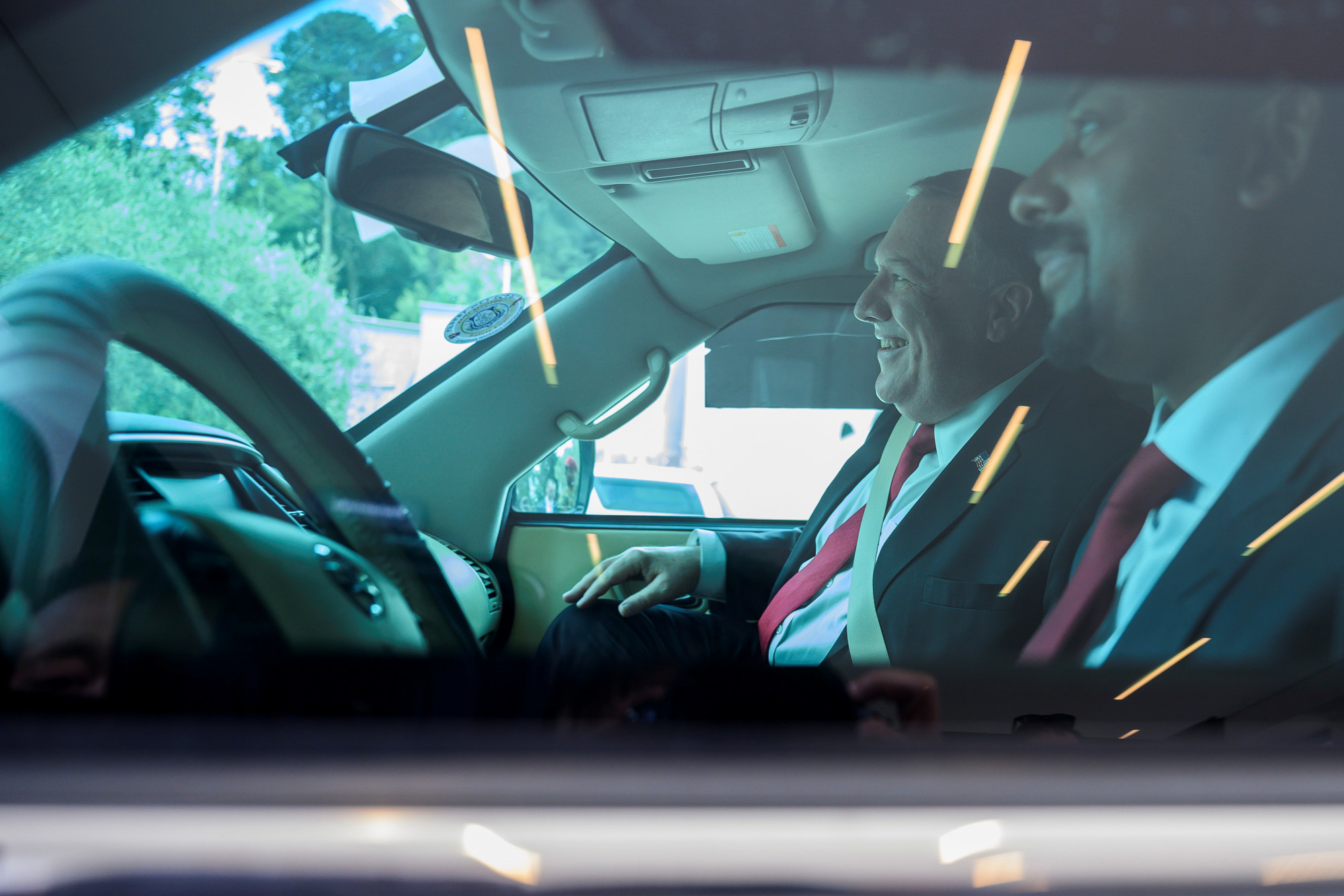 Secretary of State Mike Pompeo rides in a car with Ethiopian Prime Minister Abiy Ahmed Ali after a meeting in Addis Ababa, Ethiopia, on Feb. 18, 2020. (Andrew Caballero-Reynolds/Pool via Reuters)