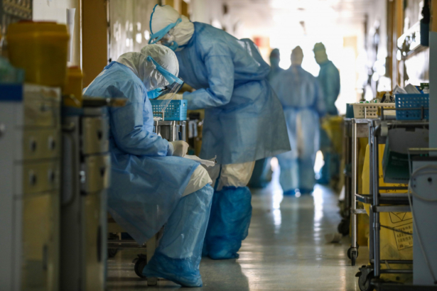 Medical staff members working at the isolation ward of the Wuhan Red Cross Hospital in Wuhan in China's central Hubei province on Feb. 16, 2020. (STR/AFP via Getty Images)
