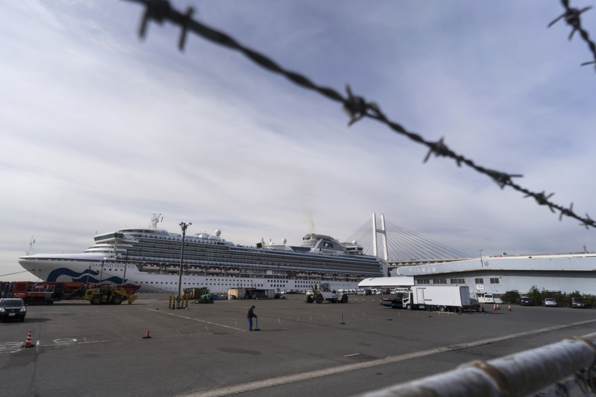 The Diamond Princess cruise ship sits docked at Daikoku Pier where it is being resupplied and newly diagnosed coronavirus cases taken for treatment as it remains in quarantine after a number of the 3,700 people on board were diagnosed with coronavirus, in Yokohama, Japan, on Feb. 12, 2020.(Tomohiro Ohsumi/Getty Images)