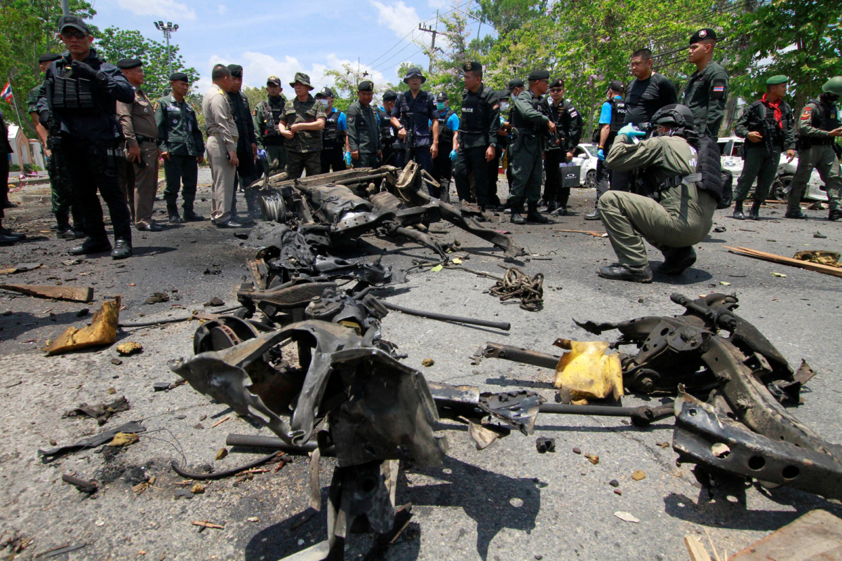 Security personnel inspect the site of a car bomb after if exploded in front of the government's Southern Border Provinces Administrative Center in Yala, Thailand, on March 17, 2020. (Surapan Boonthanom/Reuters)