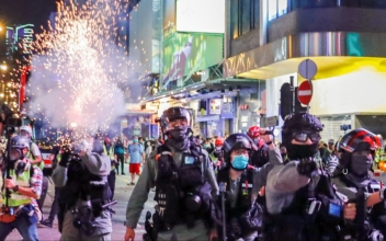 Police Fire Tear Gas as Protesters Return to the Streets in Hong Kong