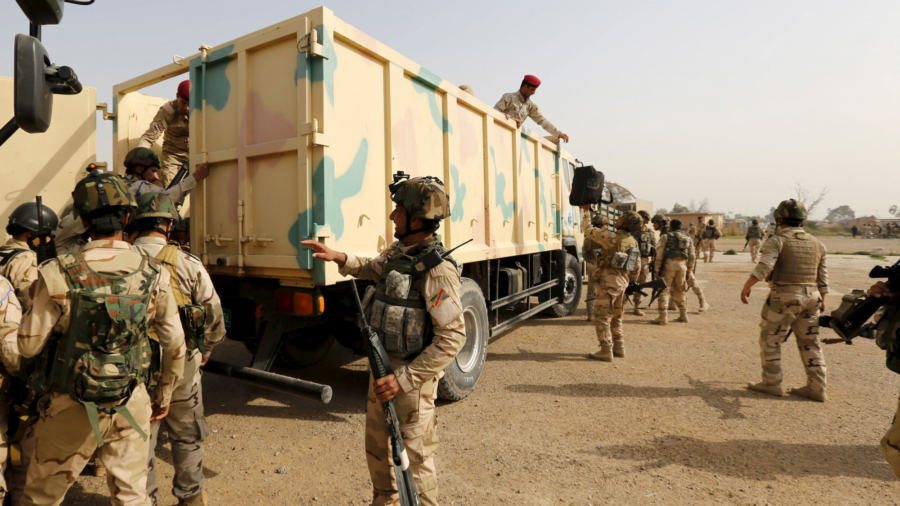 US-Led Soldiers Withdraw From Iraq’s Camp Taji Base: Officials