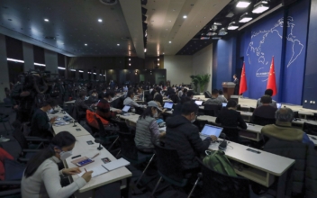 China Reporters Collect Intel for Regime: Expert