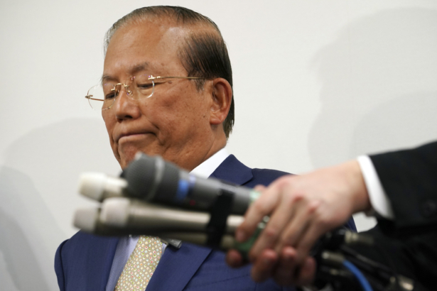 Toshiro Muto, CEO of the Tokyo 2020 Organizing Committee, listens to reporters' questions during a news conference in Tokyo, on March 17, 2020. (Eugene Hoshiko/AP Photo)