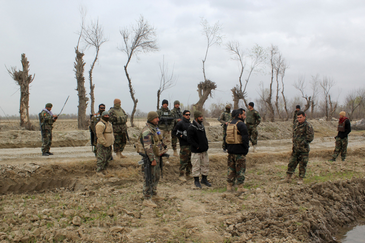 Afghan security forces stand guard after an attack by Taliban militants near an Afghan National Army (ANA) outpost, in Kunduz province on March 4, 2020. (Stringer/AFP via Getty Images)