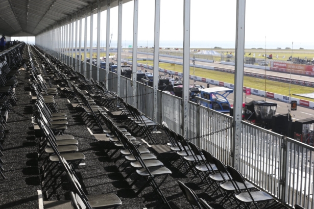 The spectator VIP area overlooking pit lane is virtually empty during the opening day of the Firestone Grand Prix of St. Petersburg, in St. Petersburg, on March 13, 2020. (Dirk Shadd/Tampa Bay Times via AP)