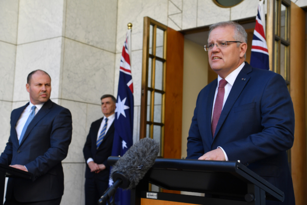 Prime Minister Scott Morrison (R), Treasurer Josh Frydenberg, and Chief Medical Officer for the Australian Government Professor Brendan Murphy (L) address the media following a Cabinet meeting at Parliament House in Canberra, Australia, on March 20, 2020. (Sam Mooy/Getty Images)