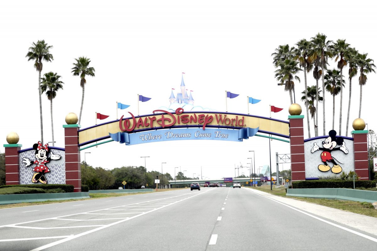The road to the entrance of Walt Disney World had few cars in Lake Buena Vista, Fla., on March 16, 2020. (John Raoux/AP Photo)
