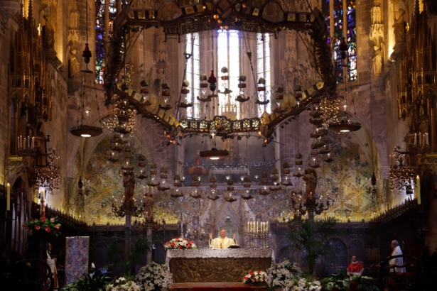 The Bishop of Mallorca Sebastia Taltavull offers the traditional Easter Sunday mass in the deserted cathedral during the CCP virus outbreak in Palma de Mallorca, Spain, on April 12, 2020. (Clara Margais/Getty Images)