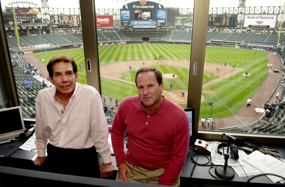 Radio broadcasters Ed Farmer, left, and Steve Stone pose in the broadcasting booth before a baseball game between the Baltimore Orioles and Chicago White Sox in Chicago on April 28, 2008. (Rich Hein/Chicago Sun-Times via AP)