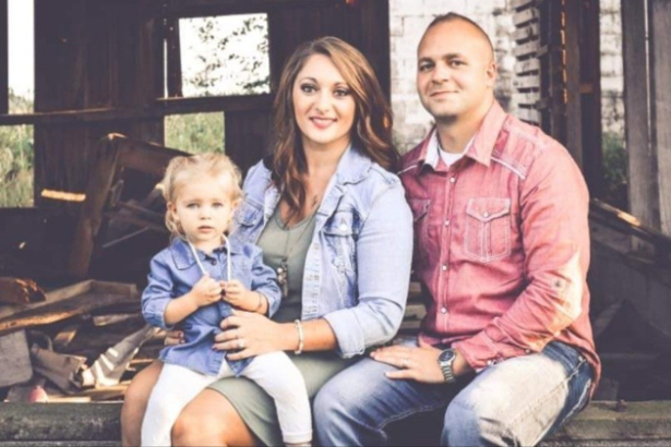 Megan Sites together with her little girl, Reign Michelle, and her husband, Donny. In an update on Tuesday, Carley Sue, the GoFundMe organizer wrote that Sites is showing signs of regaining consciousness, but she still does not know she has given birth to a healthy baby boy. (GoFundMe)