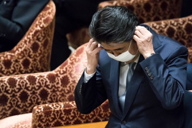 Japan's Prime Minister Shinzo Abe wears a mask during a budget committee meeting at the lower house of parliament in Tokyo on April 28, 2020. (Tomohiro Ohsumi/Getty Images)