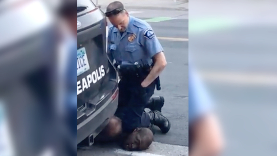 New Video Appears to Show Three Police Officers Kneeling on George Floyd