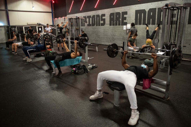 People exercise in a fitness studio in Cologne, Germany, on May 11, 2020. (Marius Becker/dpa via AP)