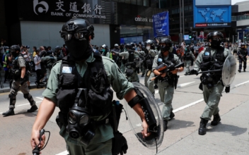 Hong Kong Police Arrest 300 as Thousands Protest