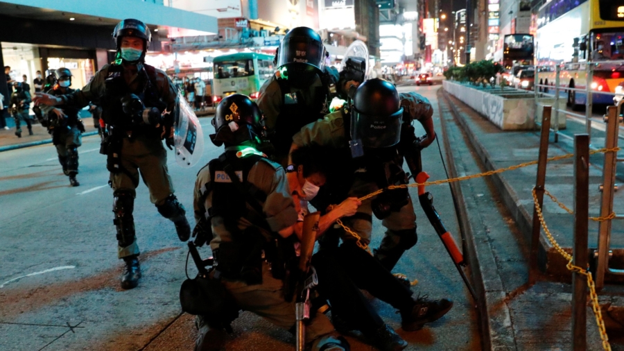 Hundreds Arrested as Hong Kong Protests Renew on Mother’s Day