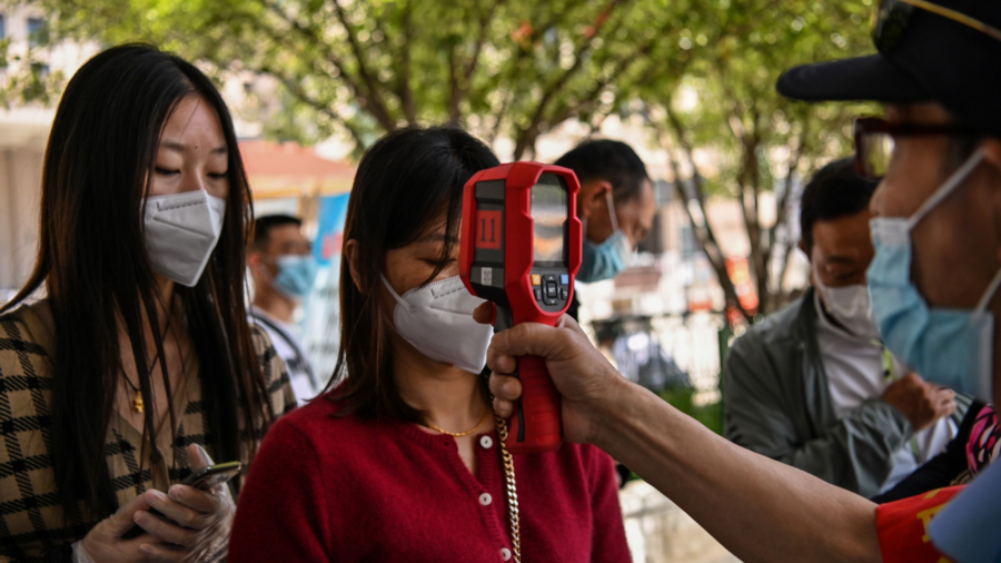 Wuhan Orders Testing of All City Residents to Contain Virus’s Spread