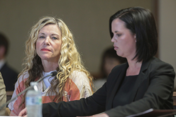 Lori Vallow (L) glances at the camera next to her defense attorney, Edwina Elcox, during a hearing in Rexburg, Idaho, on March 6, 2020. (John Roark/The Idaho Post-Register via AP)