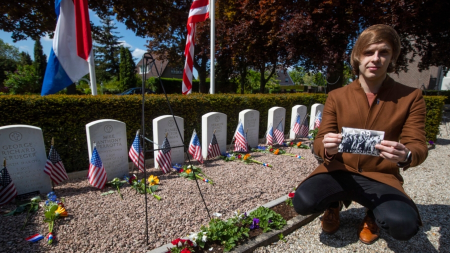 Volunteers Put Faces to Names of Americans in WWII Cemetery