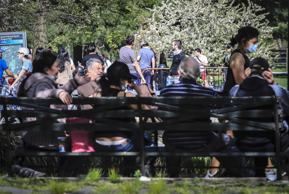 People leave home for the outdoors as temperature hovered around 70 degrees, even as stay-at-home order remained in effect, in Brooklyn’s Windsor neighborhood in New York City, on May 2, 2020. (Bebeto Matthews/AP Photo)