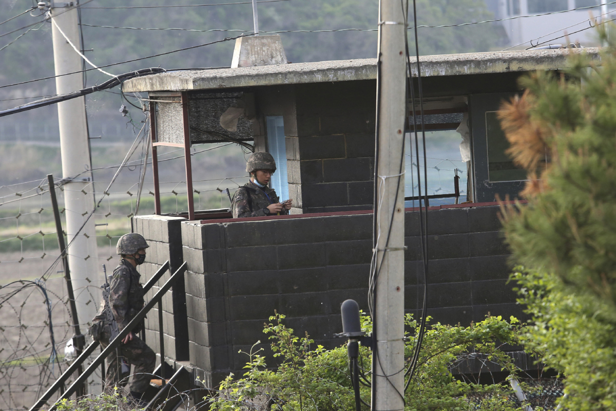 South Korean army soldiers walk up the stairs of a military guard post in Paju, South Korea, near the border with North Korea, on May 3, 2020. (Ahn Young-joon/AP Photo)