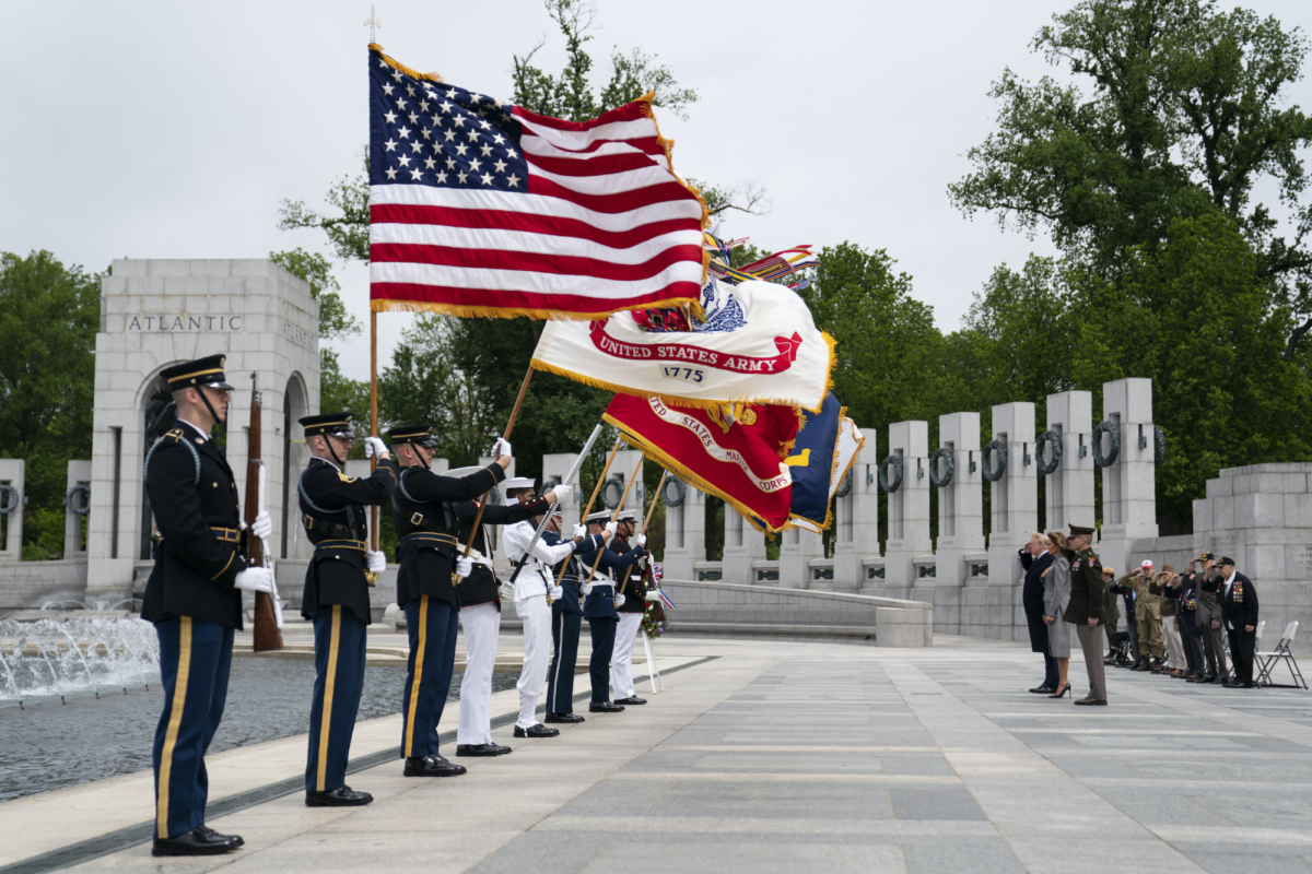 President Donald Trump and First Lady Melania Trump participate in a wreath laying ceremony at the World War II Memorial to commemorate the 75th anniversary of Victory in Europe Day, in Washington, on May 8, 2020. (Evan Vucci/AP photo)